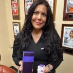 Chill Hill Med Spa 1722 staff holding Voluma Injectable and Botox products